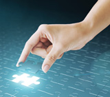 Hand embed missing puzzle piece into place